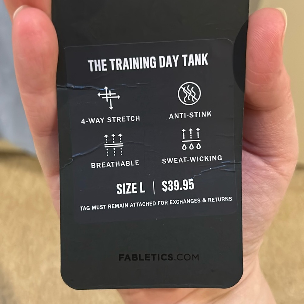 Men’s Fabletics blue tank.